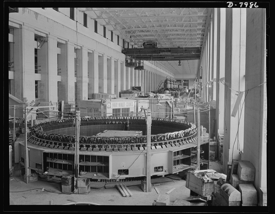 Tennessee Valley Authority. Wilson Dam hydroelectric plant construction. A partly completed stator for one of the generator units at a new addition to the TVA's hydroelectric plant at Wilson Dam. Located near Sheffield, Alabama, 260 miles above the mouth of the Tennessee River, the dam has an authorized power installation of 288,000 kilowatts, which can be increased to a possible ultimate of 444,000 kilowatts. The reservoir at the dam adds 377,000 acre-feet of water to controlled storage on the Tennessee River system