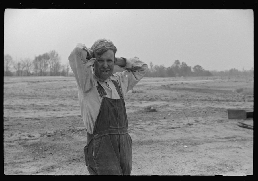 Miss Hesterley and Miss Christian, FSA (Farm Security Administration) home economists, delivering sheeting to Mr. Adkins, rural rehabilitation borrower. This is their first year on the program. There are nine in the family. Coffee County, Alabama
