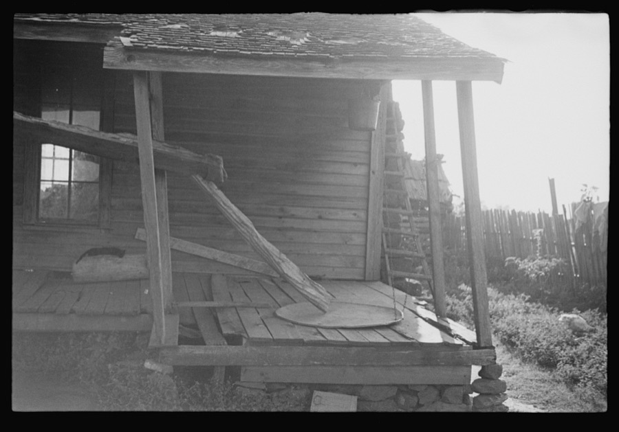 Porch of a sharecropper's cabin, Hale County, Alabama