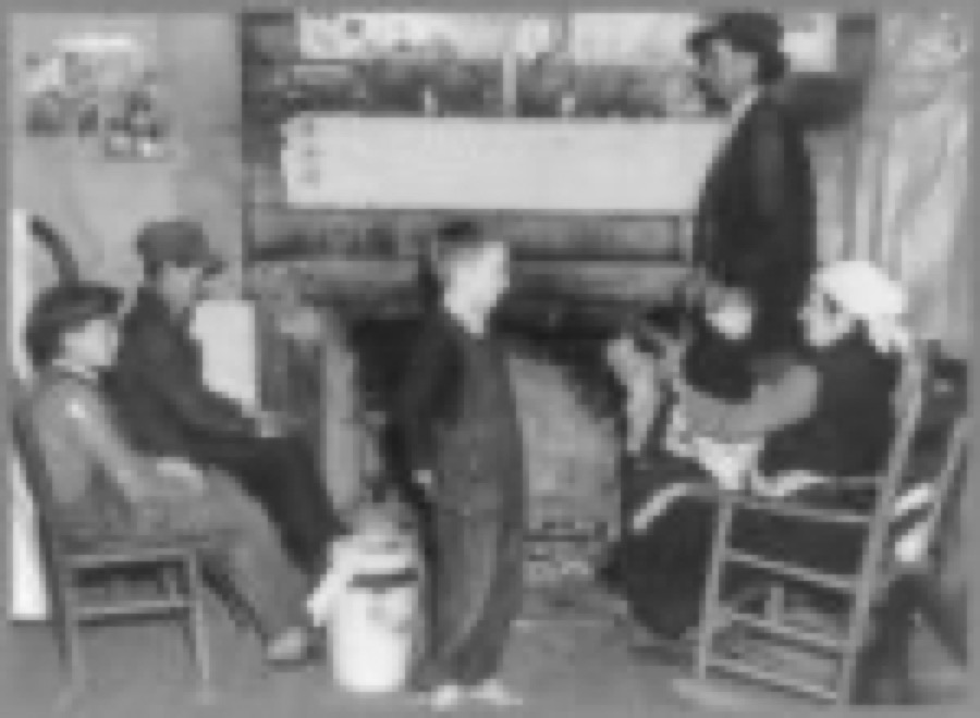 Joe Handley and family in their home at Walker County, Alabama