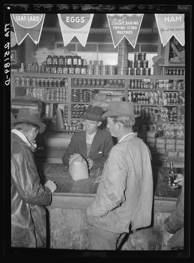 Farmers buy at store. Skyline Farms, Alabama