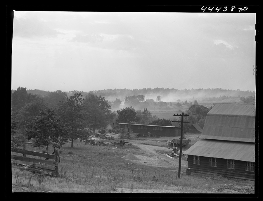 Landscape near one of the entrances to the powder plant near Childersburg. The dust in the back ground in caused by a great stream of traffic coming out of the powder plant. Alabama