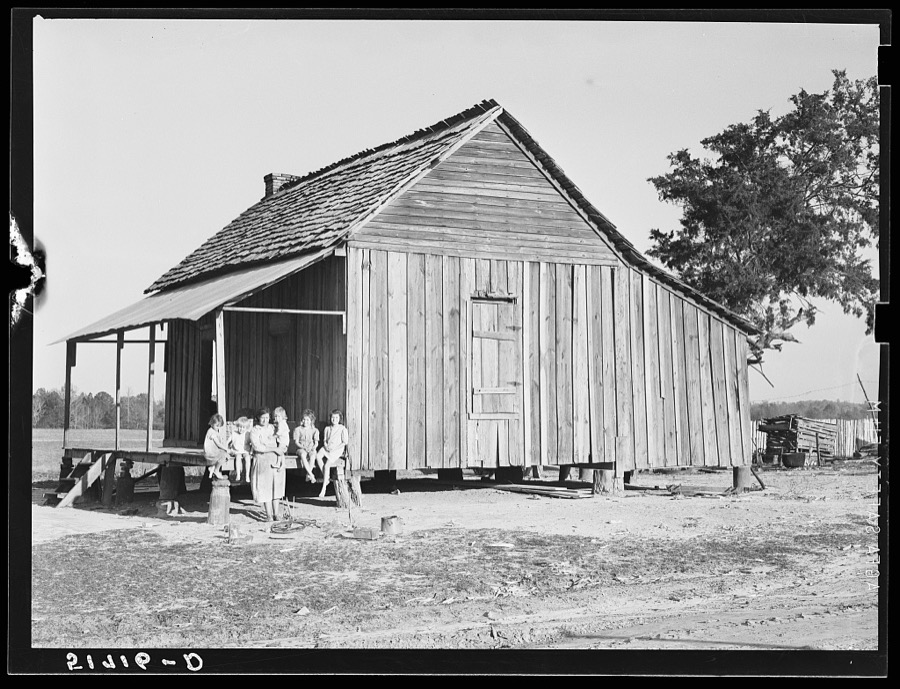 Mrs. Melody Tillery (RR-Rural Rehabilitation family) with her children on porch of their home. Pike County, Alabama