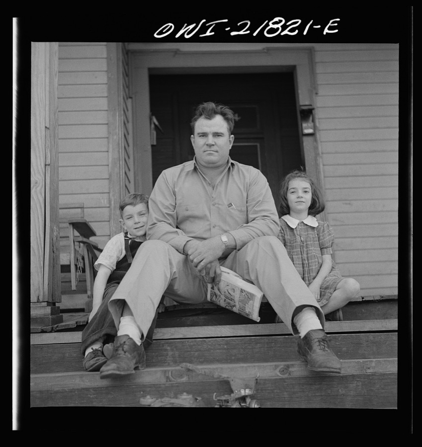 Montgomery, Alabama. Marvin Johnson, truck driver, with his two children