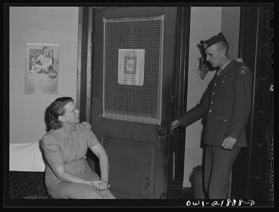 Montgomery, Alabama. Mrs. Brannon talking with a soldier stationed at the same camp as her son