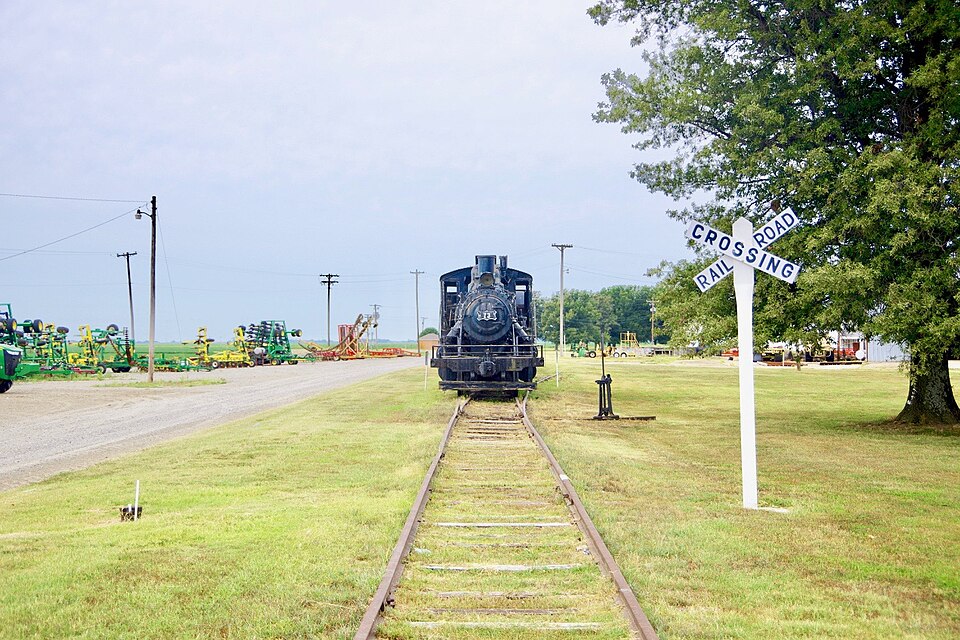 Photograph of Jonesboro, Lake City & Eastern Railroad Steam Locomotive #34 and Associated Rolling Stock