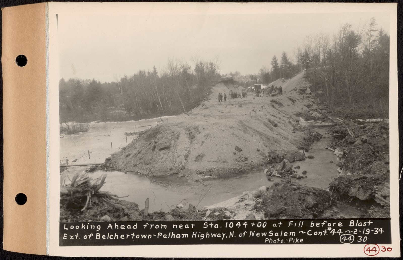 Contract No. 44, Extension of Belchertown-Pelham Highway, New Salem, Orange, looking ahead from near Sta. 1044+00 at fill before blast, New Salem, Mass., Feb. 19, 1934, Massachusetts Archives - undated