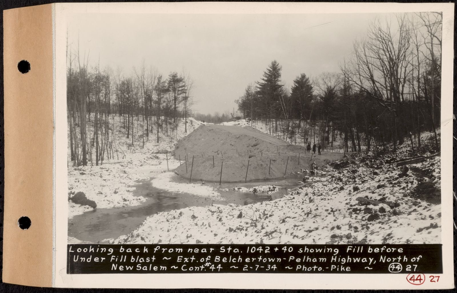 Contract No. 44, Extension of Belchertown-Pelham Highway, New Salem, Orange, looking back from near Sta.1042+40 showing fill before under fill blast, New Salem, Mass., Feb. 7, 1934, Massachusetts Archives - undated