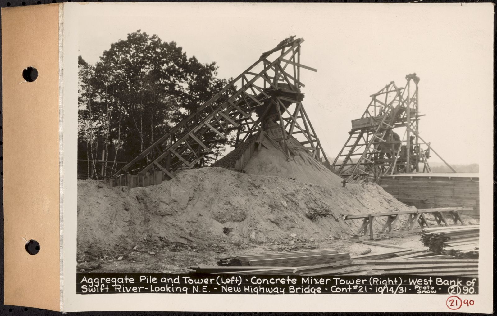 Contract No. 21, Portion of Ware-Belchertown Highway, Ware and Belchertown, aggregate pile and tower (left), concrete mixer tower (right), West bank of Swift River, looking northeast, new highway bridge, Ware and Belchertown, Mass., Oct. 14, 1931, Massachusetts Archives - undated