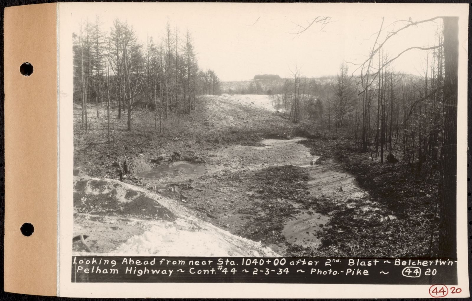 Contract No. 44, Extension of Belchertown-Pelham Highway, New Salem, Orange, looking ahead from near Sta. 1040+00 after 2nd blast, New Salem, Mass., Feb. 3, 1934, Massachusetts Archives - undated