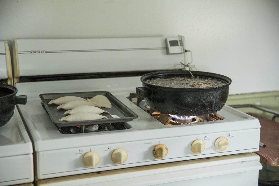 Small pies, before and during frying, inside the farmhouse at Yoder's Amish Home, an authentic Amish farm that began accepting visitors in 1983 near Walnut Creek in central Ohio, along the "Amish Country Byway"