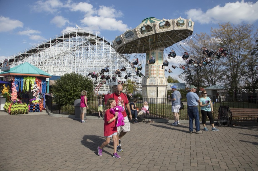 Patrons stroll among the rides at King's Island theme park in Mason, a northeastern suburb of Cincinnati, Ohio