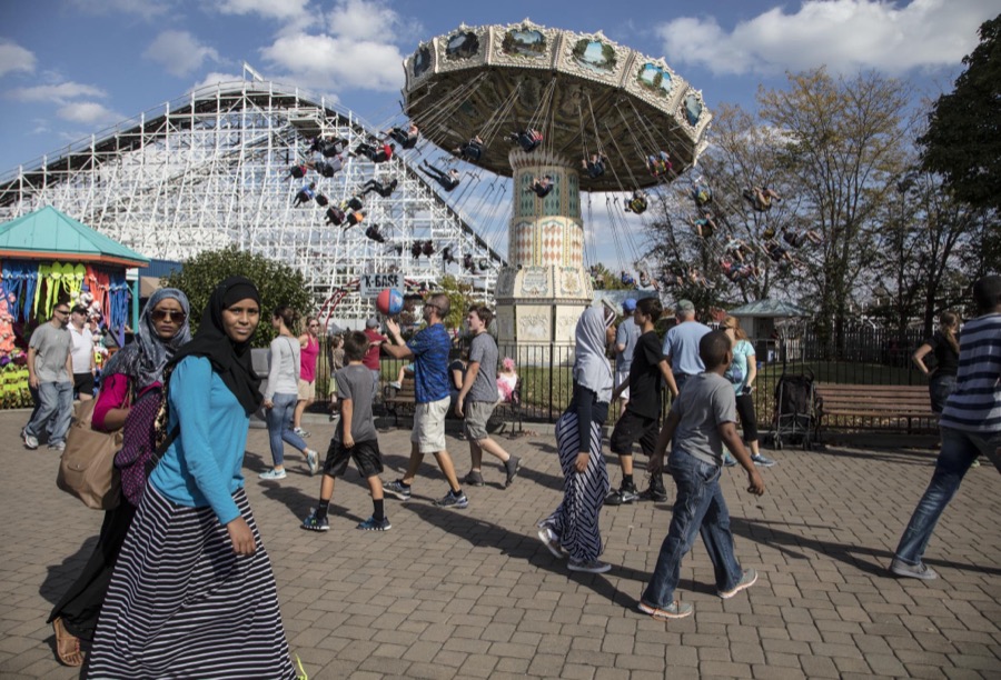 Patrons stroll among the rides at King's Island theme park in Mason, a northeastern suburb of Cincinnati, Ohio