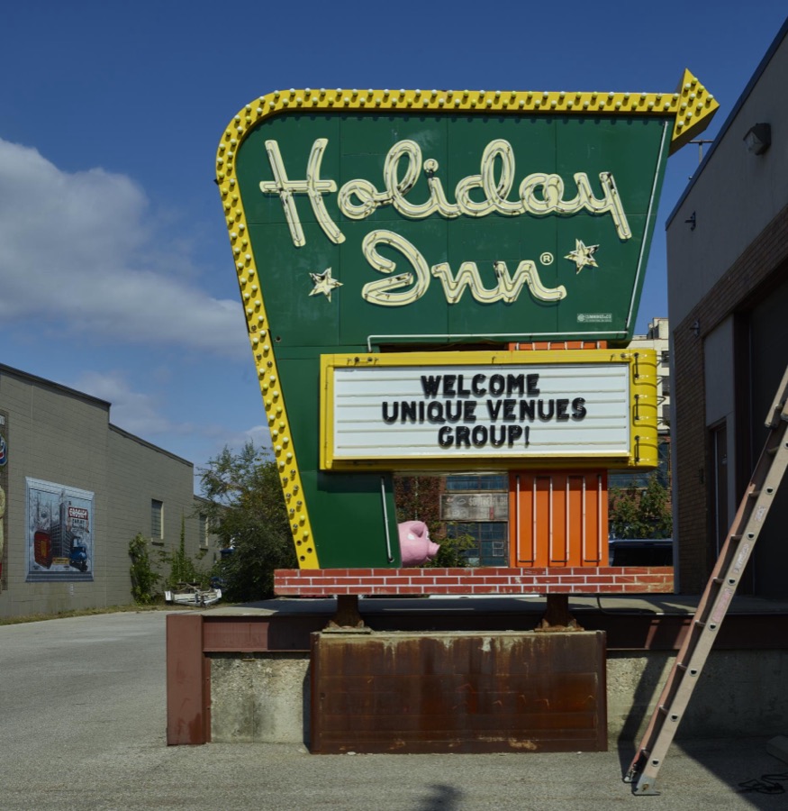 A rescued Holiday Inn hotel sign awaiting rehabilitation outside the American Sign Museum in the industrial Camp Washington neighborhood of Cincinnati, Ohio