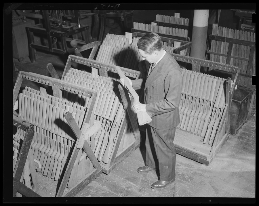 Ready for a bath. Ready for a bath in oil are these gun stocks. The oil will preserve them in the strenuous days ahead in war work
