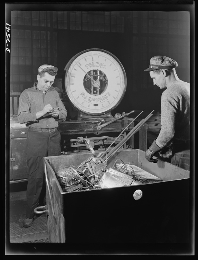 Conversion. Copper and brass processing. Weighing brass scrap. The war program calls for the use of such vast amounts of brass and copper among other metals, that all available scrap must be utilized. Here a truckload of brass trimmings from a sheet mill is being weighed. From here it will go to the casting shop, where it will be remelted and cast again into billets. Chase Brass and Copper Company, Euclid, Ohio