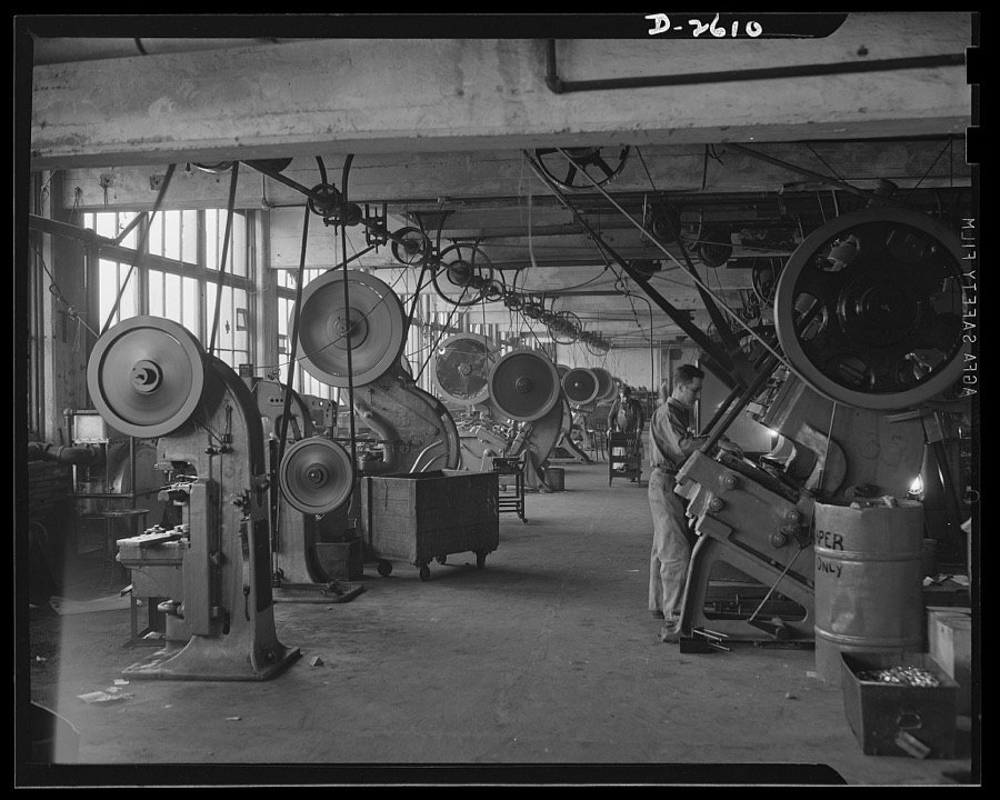 Conversion. Toy factory. Presses that once turned out metal toys and motion picture projectors are now being converted to production of filter boxes to be used in jeeps and tanks. Keystone