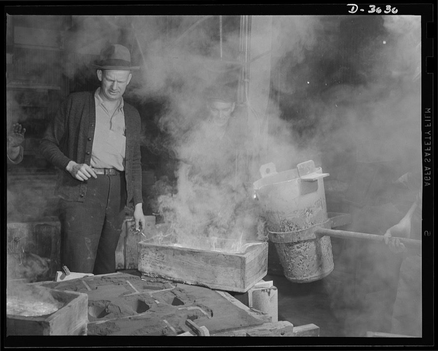 Aluminum casting. Uncle Sam's soldiers on the production lines of defense pour a large magnesium casting. The molten alloy enters the runner box first. Magnesium is one of the most valuable metals for war production. Exact purpose of this casting is kept secret. Aluminum Industries Inc., Cincinnati, Ohio