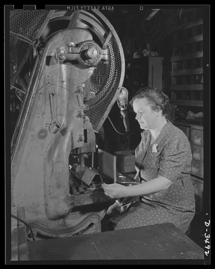 Conversion.Toy furniture to dies for incendiary bombs. The hands that rocks the cradle can also rock the Axis. American women are rapidly taking their places on the industrial front. Here in this small Midwest factory, the owner's wife operates one of the machines making dies for incendiary bombs. Sivon Machine Company, Painesville, Ohio