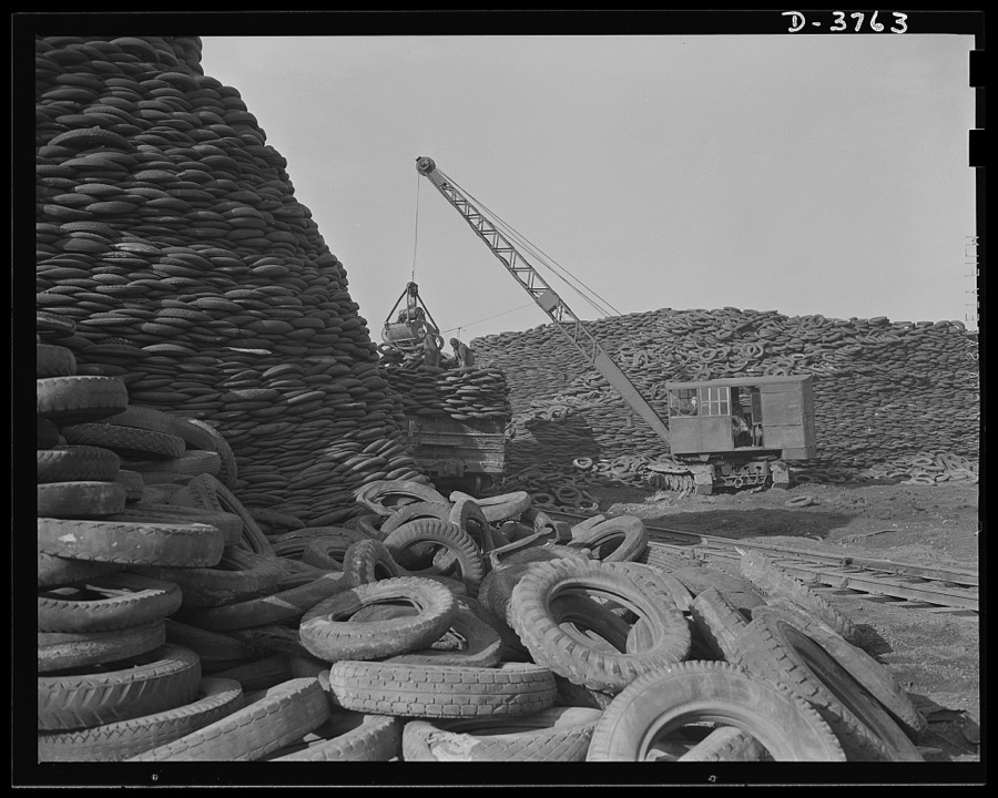 Rubber reclamation. Scrap tires mobilized for Victory. Millions of discarded casings cover more than 100 acres at one Midwest recovery plant. Systematic piling and sectional arrangement reduce fire hazard. Special processes will separate metal from the tires and tube bodies. The reclaimed material will be used to manufacture thousands of essential mechanical rubber products. Firestone