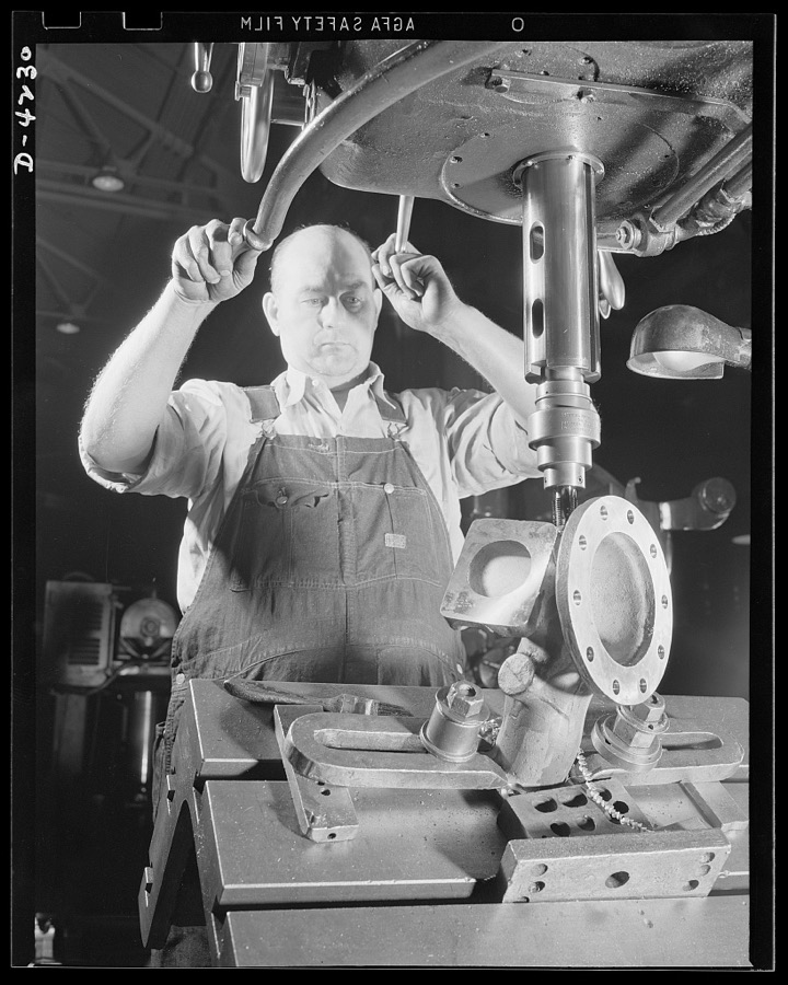 Production. Diesel engines. Diesel power for the Navy. Drilling a pump connection at an Ohio engine manufacturing plant