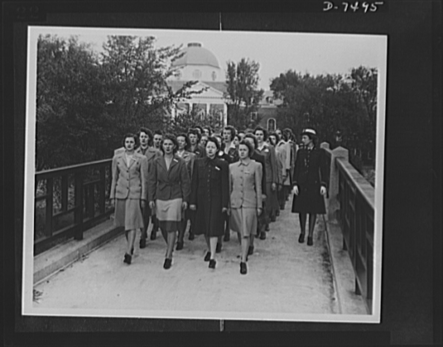 Women Accepted for Voluntary Emergency Service. Hep, two, three, four clipping of a brisk cadence, enlisted WAVES cross their first bridge enroute to their initial drill session on the Smith College Campus, Northampton, Massachusetts. The gals didn't even have time to change from their street clothes before the WAVE ensign on the right started them off for their exercise