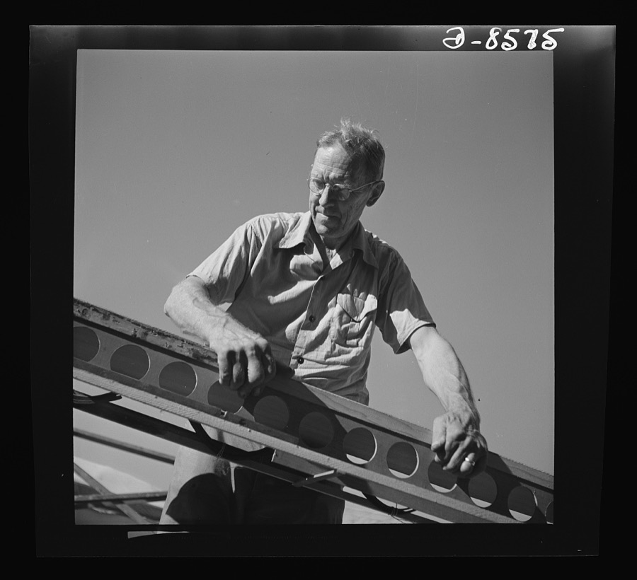 Conversion. Rowing shells to life rafts. At his old job making rowing shells for varsity crews, this veteran craftsman now helps produce plywood life rafts for Navy ships. Here he is shown at work on the frame of a rowing shell