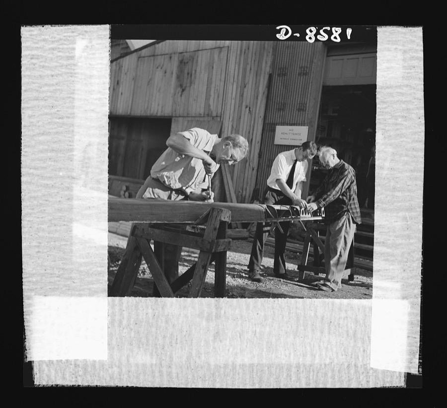 "Putting on the skin" of this rowing shell was the type of work formerly done by a New England boat builder. The company now produces plywood rafts and instrument coverings under navy contracts