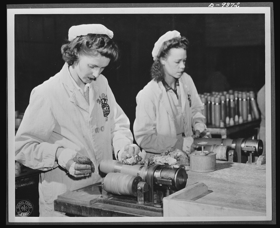 Production. Shell loading. Every shell that goes through a large Midwest loading plant must be thoroughly cleaned. These women are removing excess paint from the bands that circle the projectiles. Women also stencil firing data on the shells and perform many other essential operations. Ravenna ordnance plant