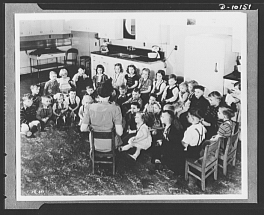 Children are taught good eating habits at nursery established by the Health for Victory Club in a new project of the club's nutrition program at the Westinghouse Electric & Manufacturing Company, at Mansfield, Ohio. Under the direction of a paid kindergarten teacher, the children are taught fundamentals of food and health, while their mothers, who are wives of war workers at the plant, study new points of nutrition under war-time conditions. The Health for Victory Club at the Mansfield plant has developed a program of safeguarding workers' health by buying and serving the foods that make up well-balanced meals that is now used by 640 war plants throughout the country. The Mansfield plant has a labor-management committee formed by representatives of the management and the United Electrical and Radio Machine Workers of America