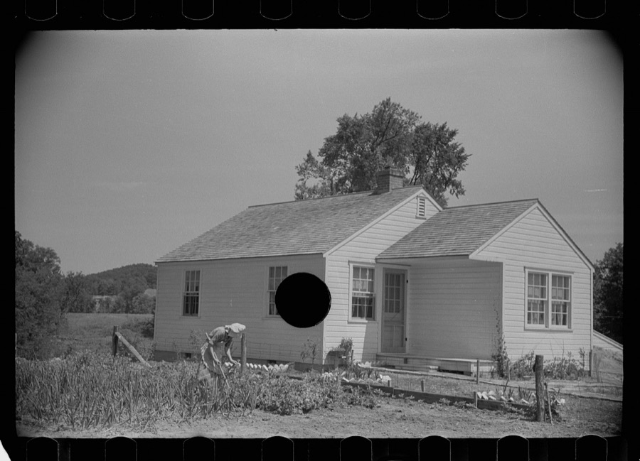 Wife of homesteader in garden, Scioto Farms, Ohio