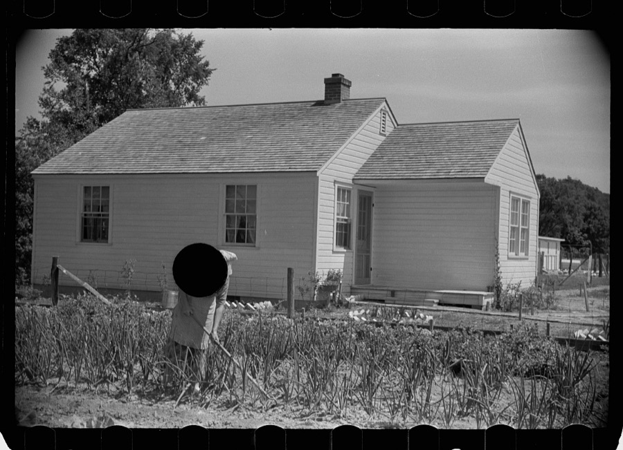 Wife of homesteader in garden, Scioto Farms, Ohio
