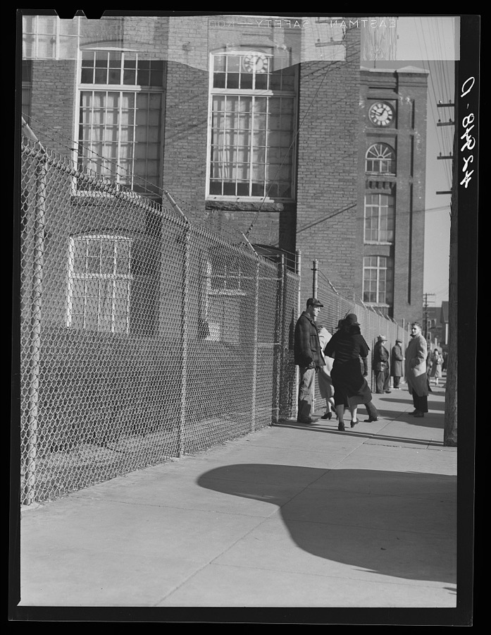Workers entering a textile mill in New Bedford, Massachusetts