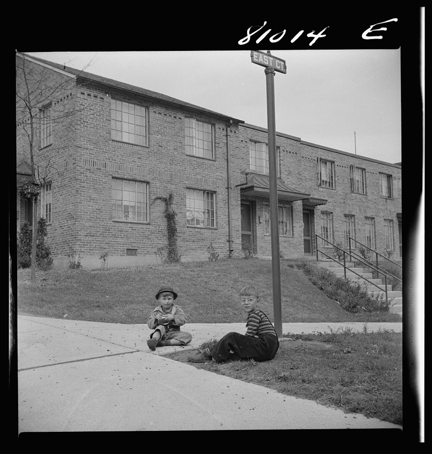 Children play in safety in the FHA (Federal Housing Administration) low income housing project at Holyoke, Massachusetts
