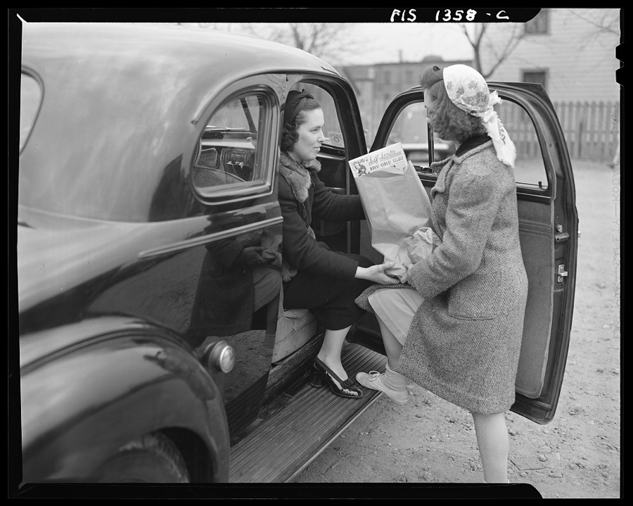 [Untitled photo, poossibly related to: New Bedford, Massachusetts. Wife and daughter of Portuguese workman on shopping trip