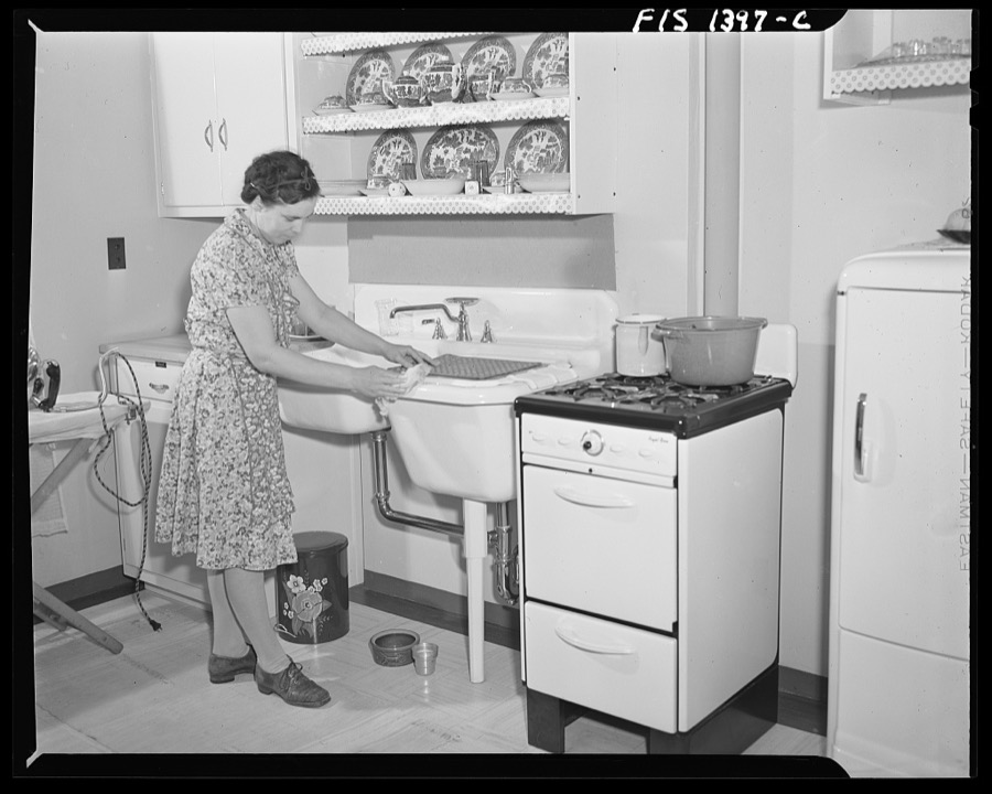 New Bedford, Massachuetts. Wife of Portuguese house painter in her home built by the government