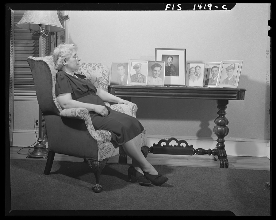 New Bedford, Massachusetts. Portuguese mother with pictures of her sons who are all in service