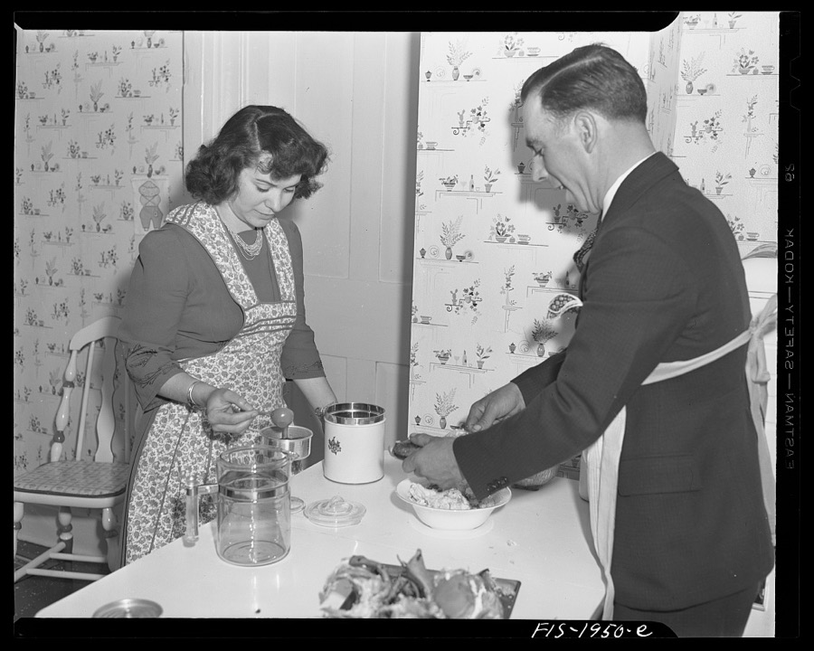 Provincetown, Massachusetts. John Russe, Jr., a Portuguese fisherman, and his wife preparing a lobster and coffee for dinner