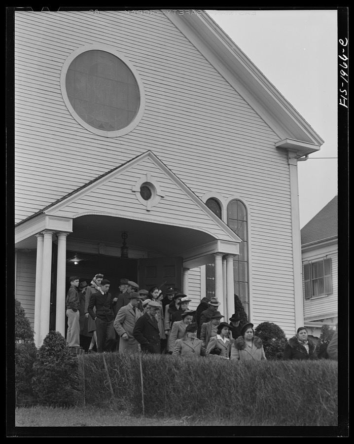 Provincetown, Massachusetts. Congregation leaving church in a Portuguese section