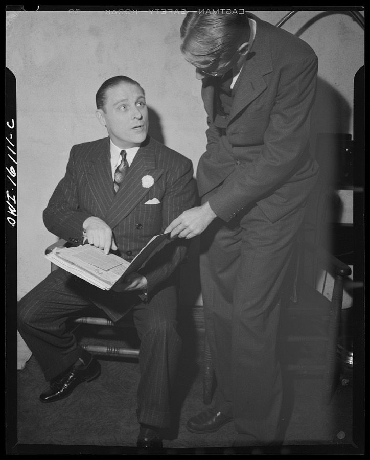 Toledo, Ohio. Evangelical church ceremony at which the preacher delivered a hysterical speech, and then burned a copy of Hitler's Mein Kampf. Preacher with burned copy of Mein Kampf in one hand and the Bible in the other