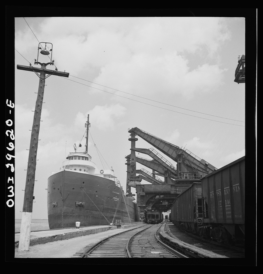 Cleveland, Ohio. Unloading a lake freighter by means of Hewlett [i.e., Hulett] unloaders at the Pennsylvania Railroad iron ore docks