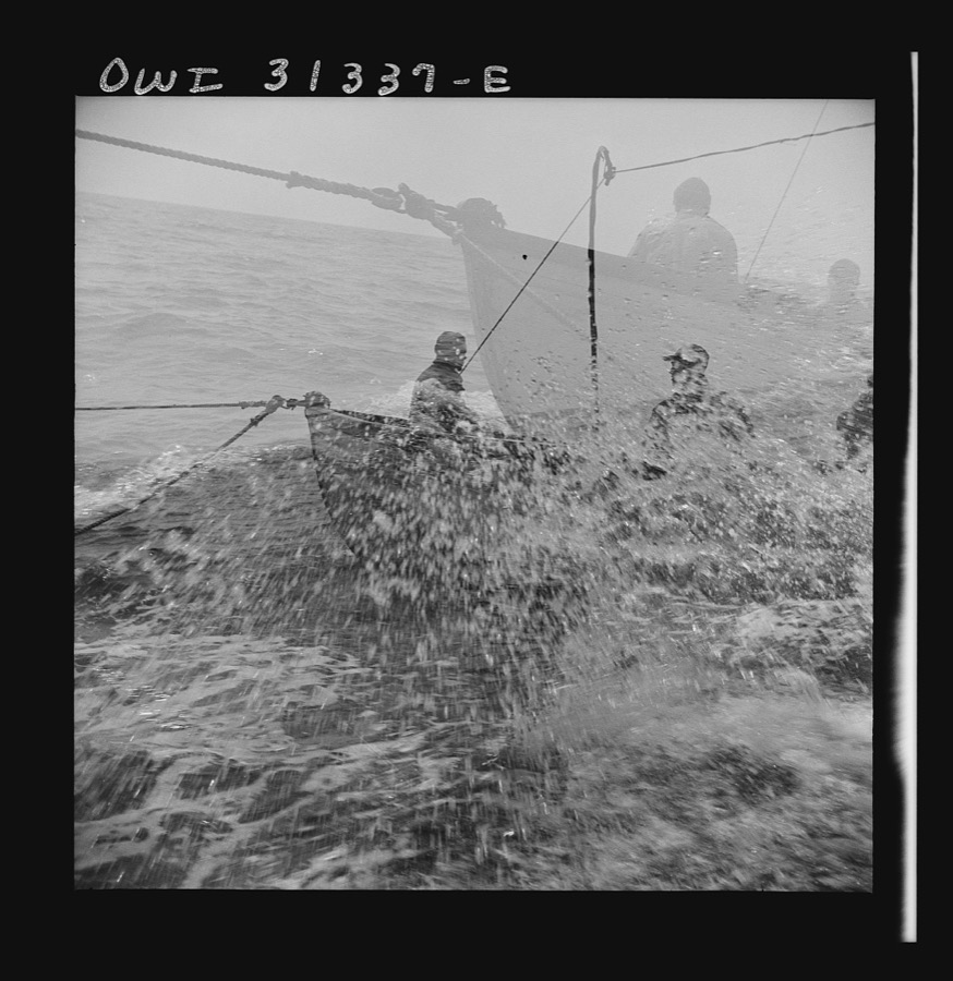 On board the fishing boat Alden, out of Gloucester, Massachusetts. Fishermen chasing a school of mackerel
