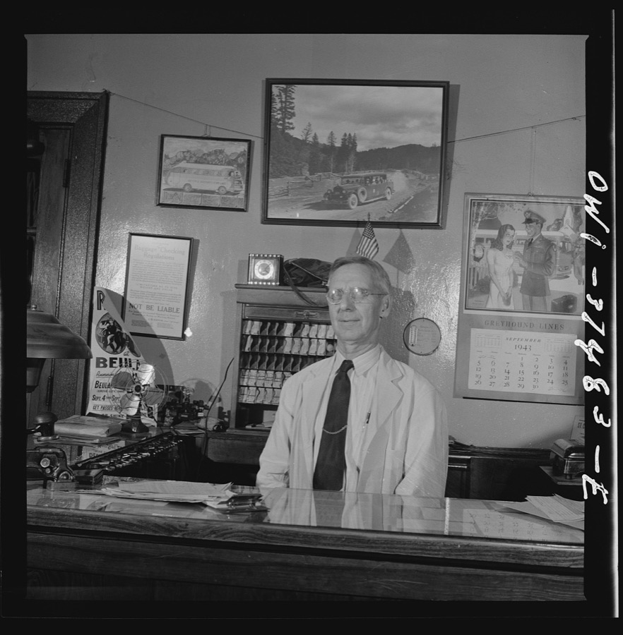 Washington Court House, Ohio. A ticket agent at a small bus station