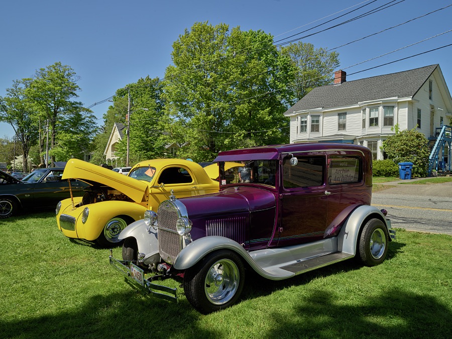 Among the exhibited autos at a small antique-car show on the green in [Belchertown], Massachusetts