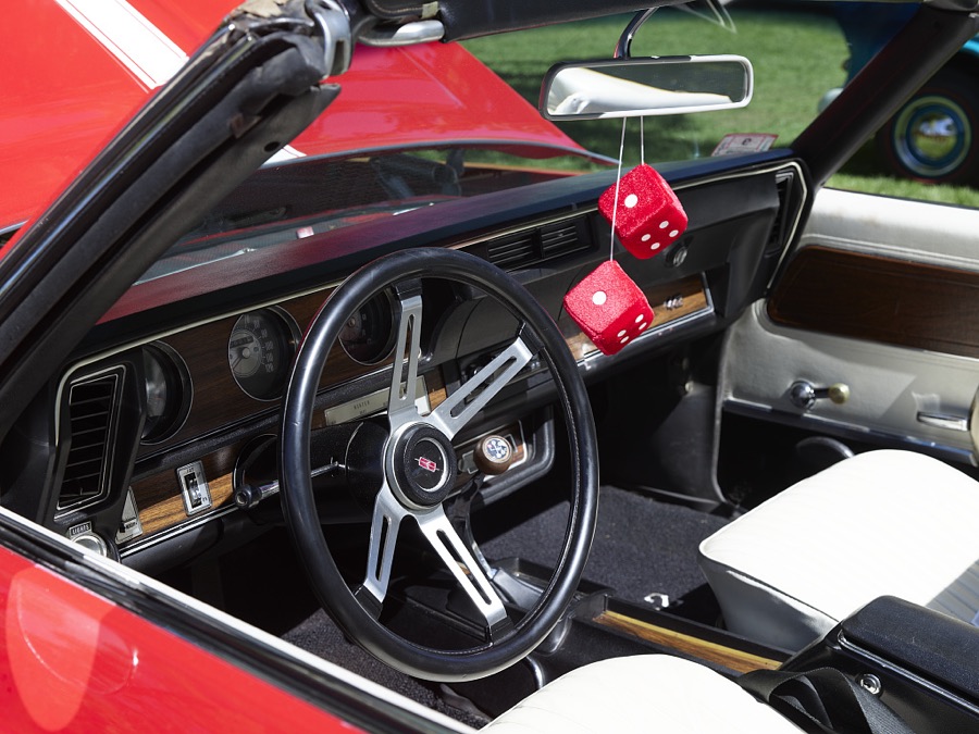 As this exhibit at a small antique-car show on the green in [Belchertown], Massachusetts demonstrates, hanging dice were a popular decoration in hot rods and convertibles in the 1950s and 60s