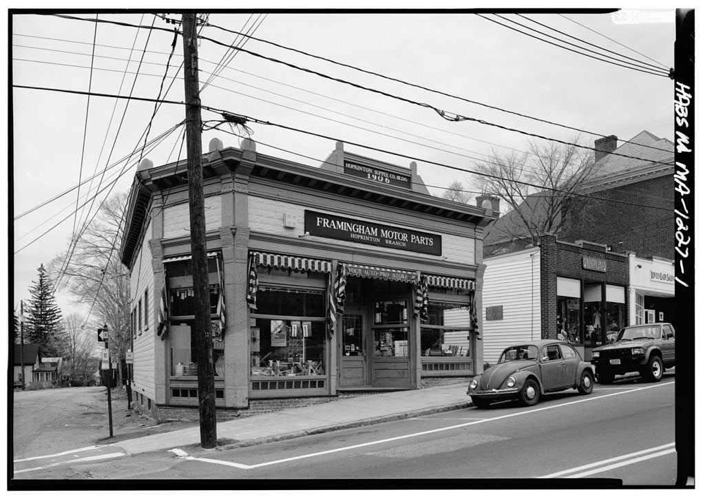 Hopkinton Supply Company Building, 26-28 Main Street (corner of Wolcott Street), Hopkinton, Middlesex County, MA, photograph filed with the federal survey