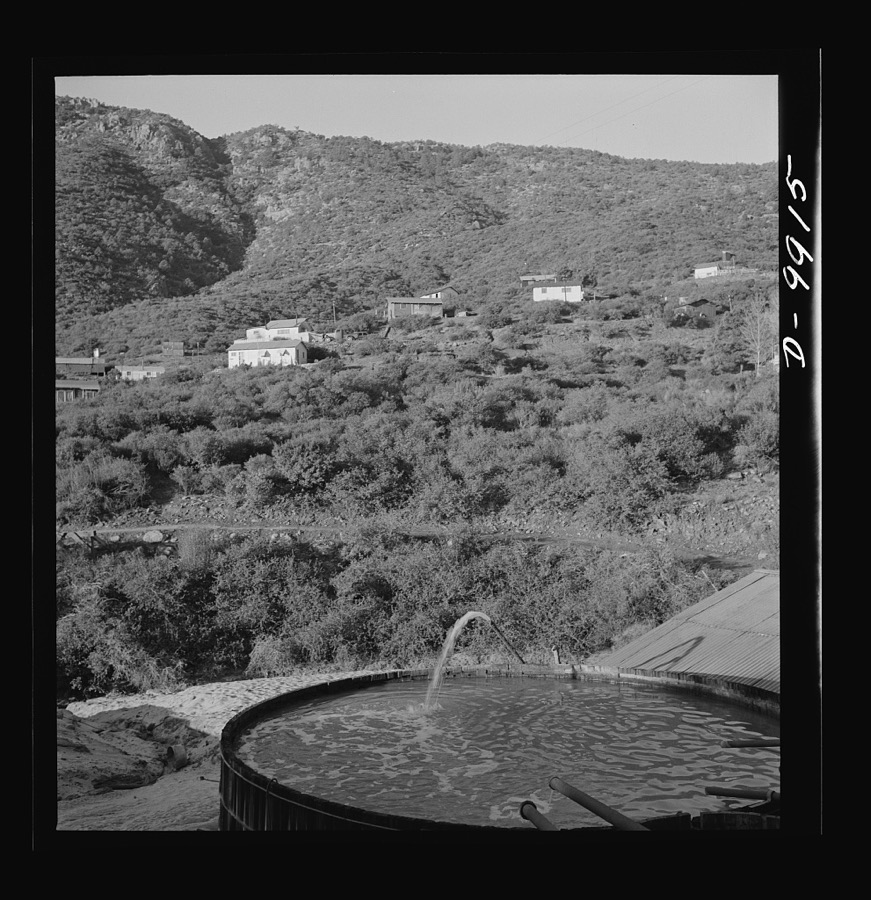 Production. Tungsten. Water tank at a tungsten concentrating plant near Kingman, Arizona. The Boriana mine and plant at this point are producing large amounts of tungsten, for which there are many vital uses in the war effort. Boriana Mine, Arizona