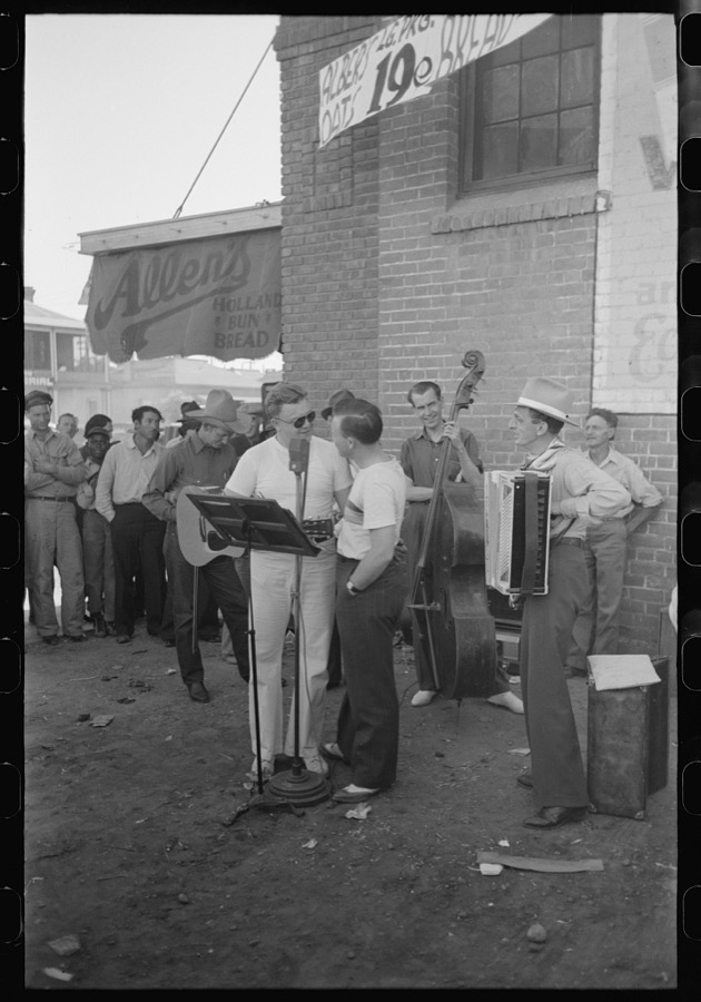 Orchestra playing outside a grocery store on Saturday afternoon which is designed to attract customers to the store, Phoenix, Arizona