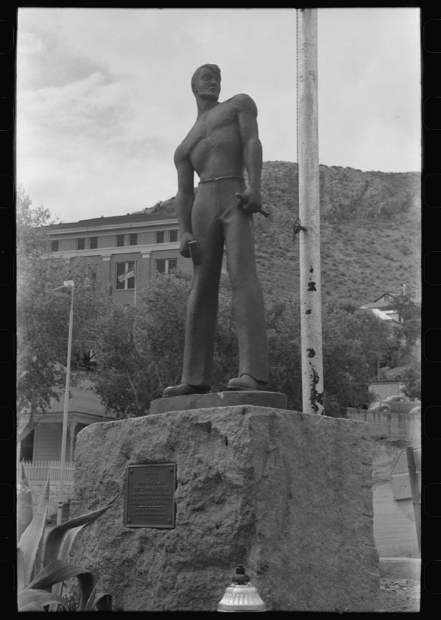 Miners monument in Bisbee, Arizona. This monument is cast in cement, sprayed with molten copper and mounted on a block of Colorado granite used for miners' drilling contests in the nineties. The monument was erected in 1935