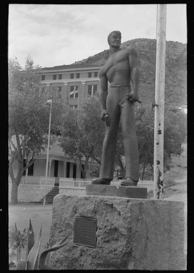 Miners monument in Bisbee, Arizona. This monument is cast in cement, sprayed with molten copper and mounted on a block of Colorado granite used for miners' drilling contests in the nineties. The monument was erected in 1935